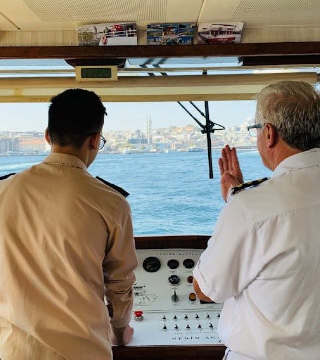 pexels-photo-3660828-3660828 Ship captain and crew member discussing navigation on the Bosphorus in Istanbul.